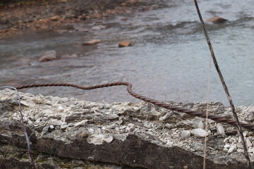 Old rusted rebar ribar from a crumbling bridge