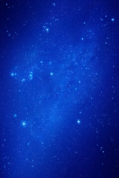 Night starry sky. Stars and nebula. Blue vertical space background