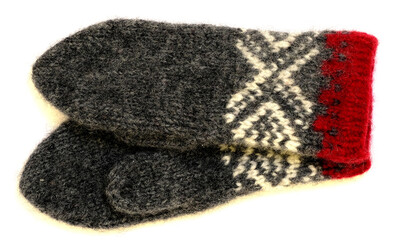 gray knitted woolen mittens with white ornament and a red rim