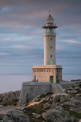 Fototapeta na wymiar Beautiful vertical image of the Punta Nariga Lighthouse in Galicia, Spain. Ideal for magazine