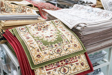 wool carpets on the shelves of stores