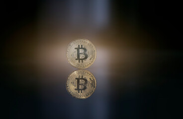 Bitcoin. Crypto currency Gold Bitcoin, BTC, Bit Coin. Macro shot of Bitcoin coins isolated on black background Blockchain technology, bitcoin mining concept. 3d rendering