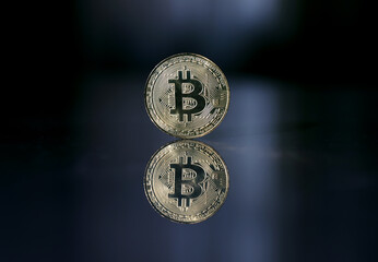 Bitcoin. Crypto currency Gold Bitcoin, BTC, Bit Coin. Macro shot of Bitcoin coins isolated on black background Blockchain technology, bitcoin mining concept. 3d rendering