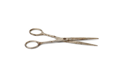 very old vintage metal tailor scissors isolated on a white background