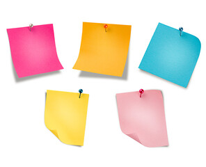 five colored notes on pins. on isolated background
