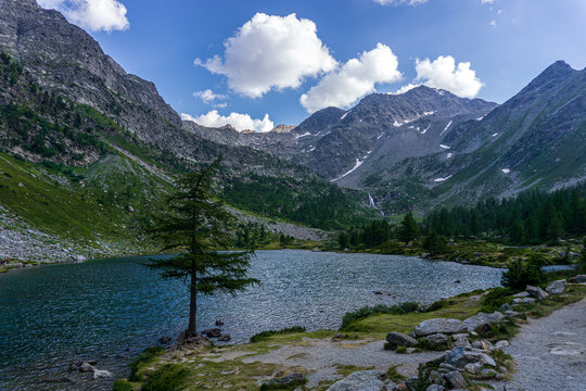 The nature and landscape of the alps seen from the shores of Lake Arpy, in the Aosta Valley, near the town of La Thuile, Italy - August 2020.