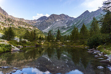 Naklejka na ściany i meble The nature and landscape of the alps seen from the shores of Lake Arpy, in the Aosta Valley, near the town of La Thuile, Italy - August 2020.