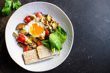 fried eggs vegetables omelet ready to eat on the table meal snack outdoor top view copy space for text food background rustic image keto or paleo diet