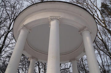 White gazebo in a snow-covered park