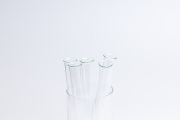 laboratory test tube glassware isolated over gray background. research minimal concept. copy space