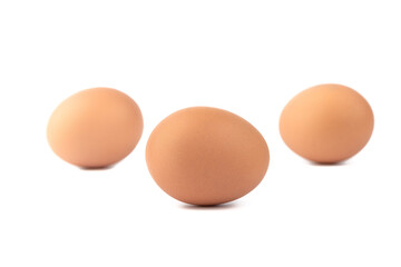 Soft focus. Three eggs over a white background.