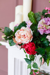 Decorated vintage room in natural style with a lot of flowers. Sofa, braided and twined with flowers.