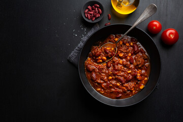 Classic chili con carne served on plate - obrazy, fototapety, plakaty