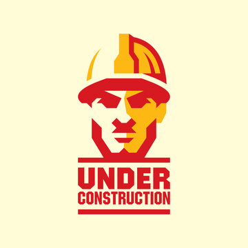 Angry builder. Under construction sign.