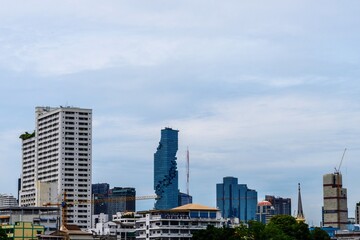 Fototapeta na wymiar Modern Buildings In City Against Sky