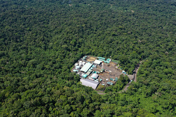 Top view, still video of an oil pumping platform in an oil field of the Amazon rainforest of South America
