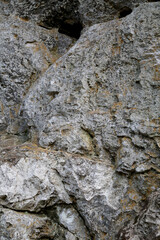 The texture of the rock. Mountain cliff of rock surface. Natural cave wall.