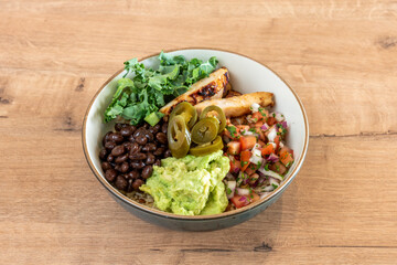 bowl with roast chicken and vegetables