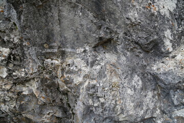 The texture of the rock. Mountain cliff of rock surface. Natural cave wall.