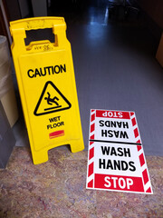 Hospital floor safety signs - wet floor and wash hands
