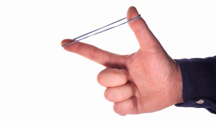 Caucasian Male Shooting Rubber Band with Index Finger and Thumb