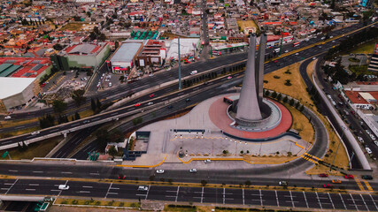 Toluca city, aerial urban landscape, you can see the Bicentennial Towers, main avenues, buildings and neighboring houses