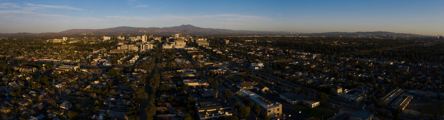 Fototapeta na wymiar Sunset aerial view of the downtown skyline of Santa Ana, California, USA.