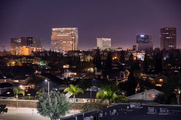 Night time view of the skyline of downtown Costa Mesa, California, USA.