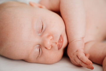 sleeping baby. the mode of the day, healthy sleep in newborns.