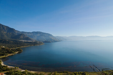Lake Atitlan in Guatemala in the morning seen from the viewpoint in San Juan la Laguna - landscape...