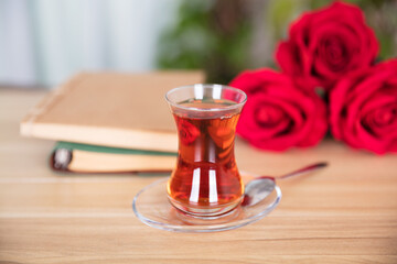 Books to be read and a cup of Turkish tea