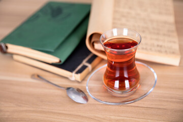 A cup of Turkish black tea and a few books