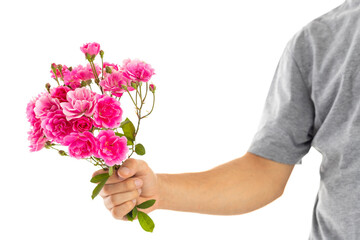 man with flowers on his hands from valentines day gift to girlfriend