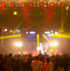 Fototapeta na wymiar Bright colorful stage lights of blur background, Bokeh concert light