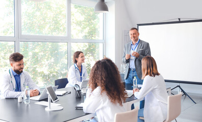 Fototapeta premium Team of doctors during meeting in modern clinic