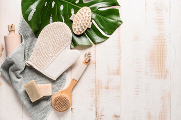 Composition with bath accessories on wooden background