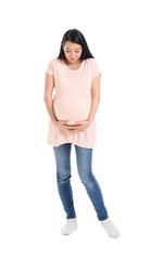 Pregnant Asian woman on white background
