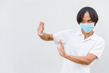 Asian man wear hygienic mask show acting social distancing concept  for Avoid physical contact with other people