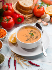Turkish Ezo Gelin soup with colorful vegetables on the table. It is one of the most important soups of Turkish cuisine. Top view. Copy space. 