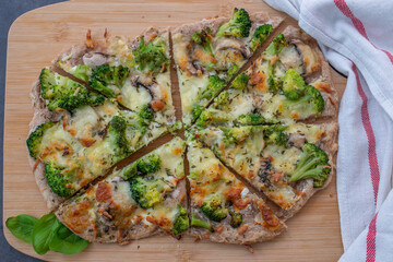 healthy green whole grain pizza with vegetables