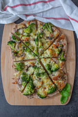 healthy green whole grain pizza with vegetables