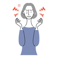 イライラした様子のシニア女性