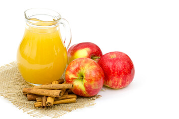 Apple juice and apples on white background