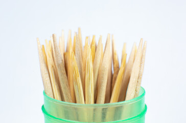 Wooden toothpicks macro photo. Close up background.