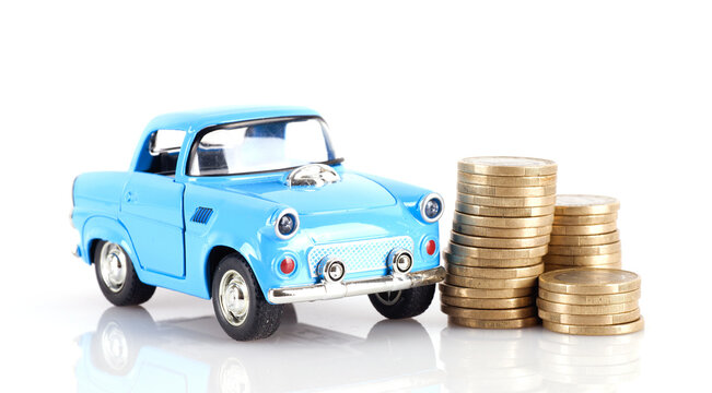 Car model and a pile of euro coi