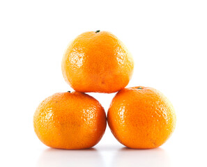 Three oranges on white background