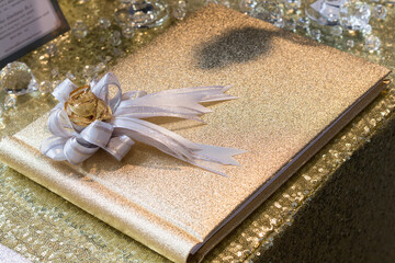 gold notebook for wishes in wedding