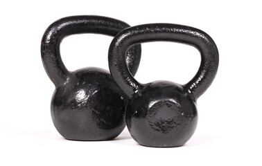 Naklejka na ściany i meble Black kettlebells isolated on white