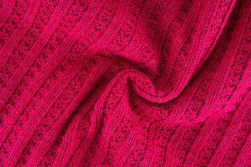 Red knitted scarf texture background