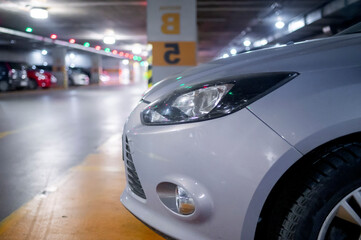 Fototapeta na wymiar Underground parking with cars. Underground car garage